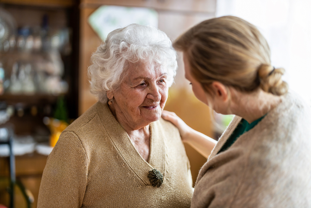 Dementia home care - carer interacting with a person living with dementia